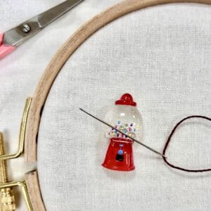 Soporte agujas máquina de caramelos